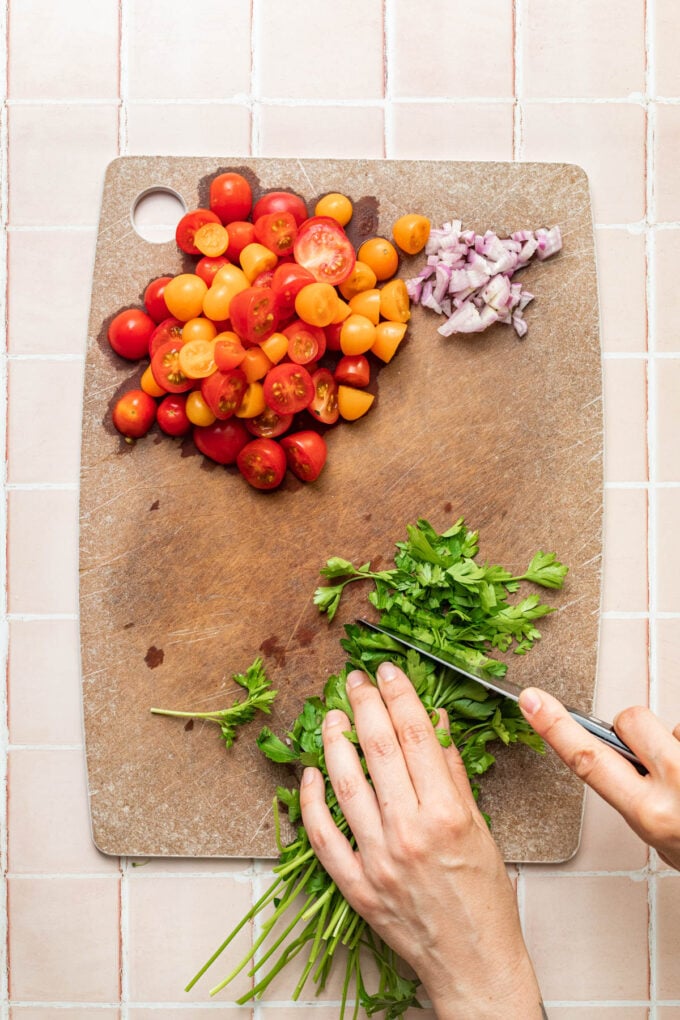 hand slicing parsley