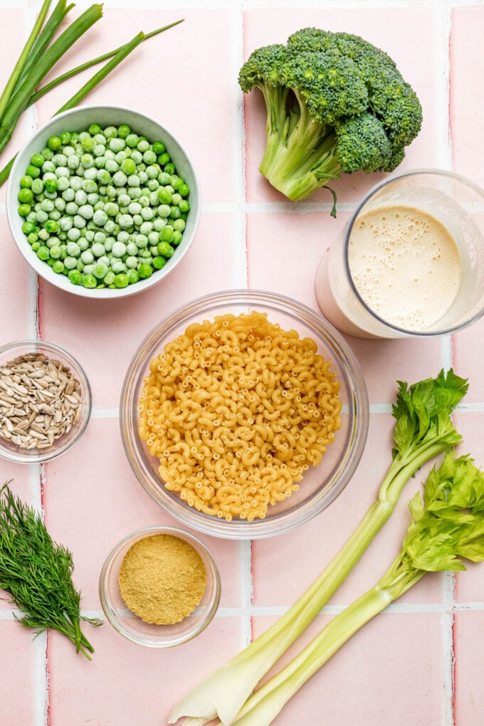 pasta and peas and broccoli in bowls