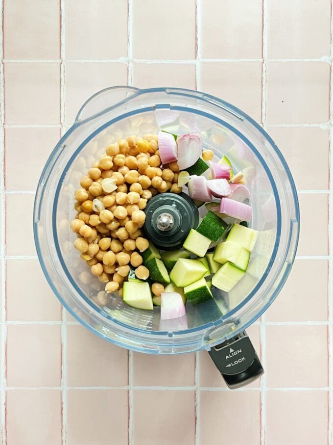 chickpeas, zucchini, shallot in food processor