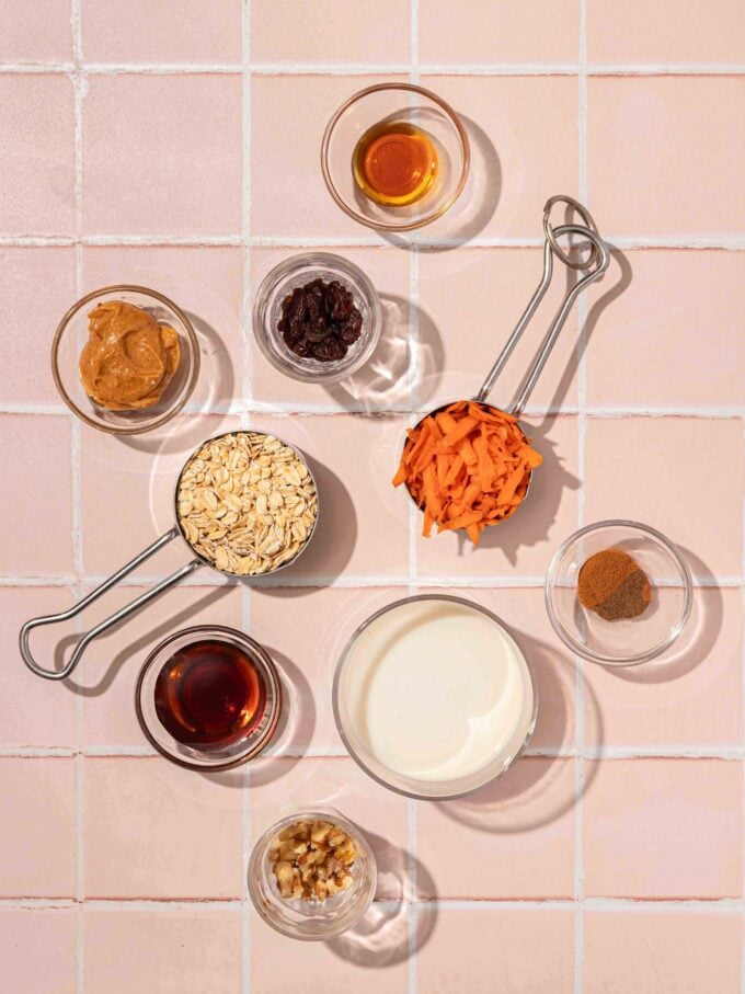 carrots, oats and spices in glass bowls