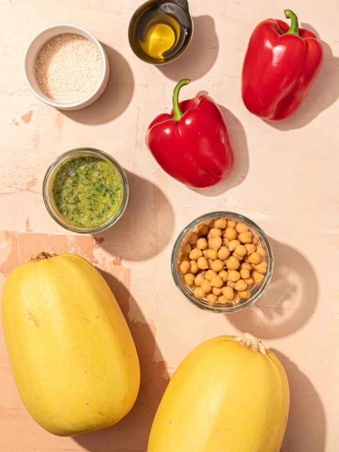 squash, peppers, chickpeas and pesto in jar