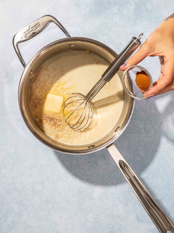 pot with whisk and cinnamon