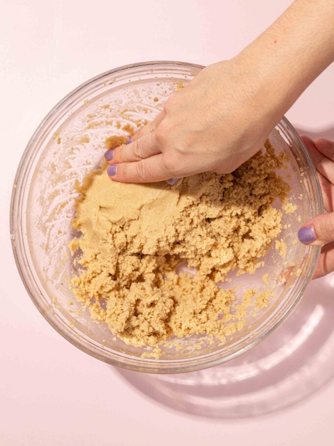 hand kneading cookie dough