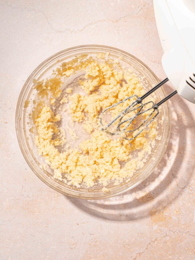 hand mixer with bowl of butter