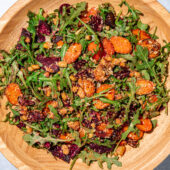 roasted beet and carrot salad in wooden bowl