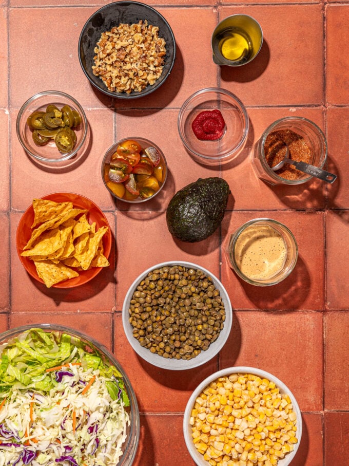 avocado, lentil, walnuts and lettuce in bowls