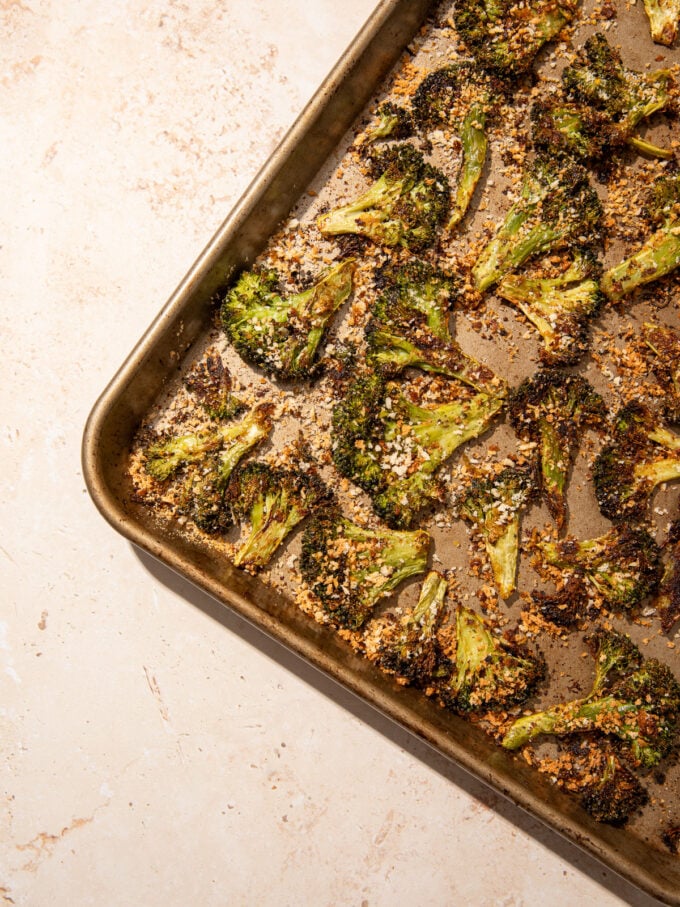 crispy smashed broccoli on baking sheet