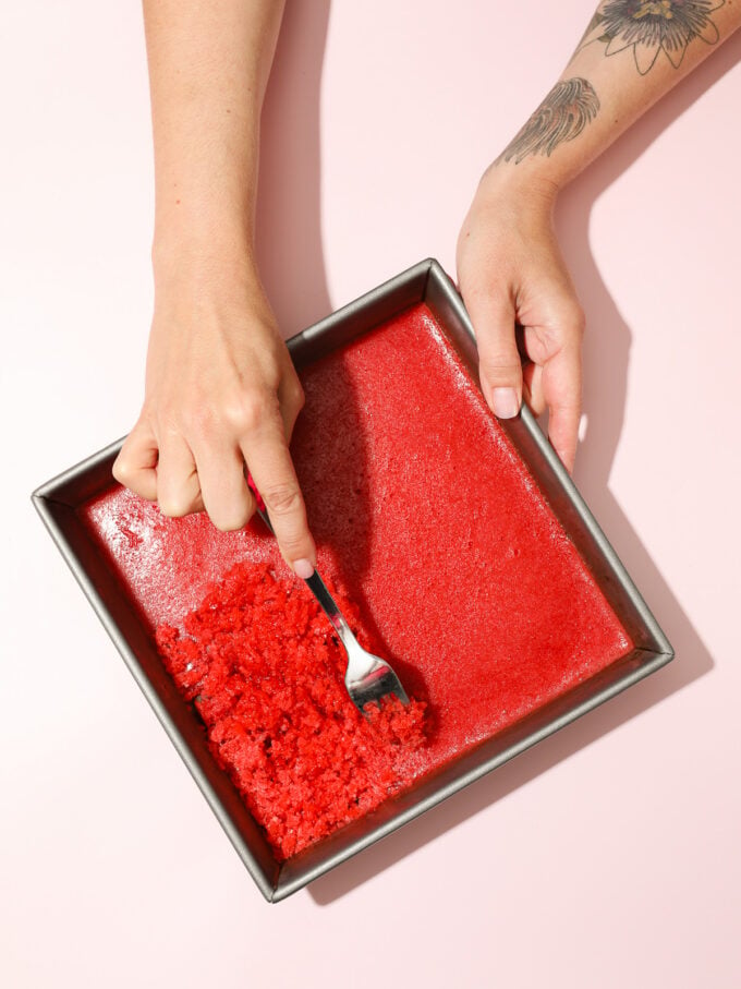 hand scraping granita with a fork