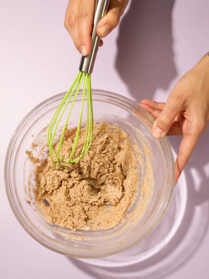 hand whisking biscuit dough