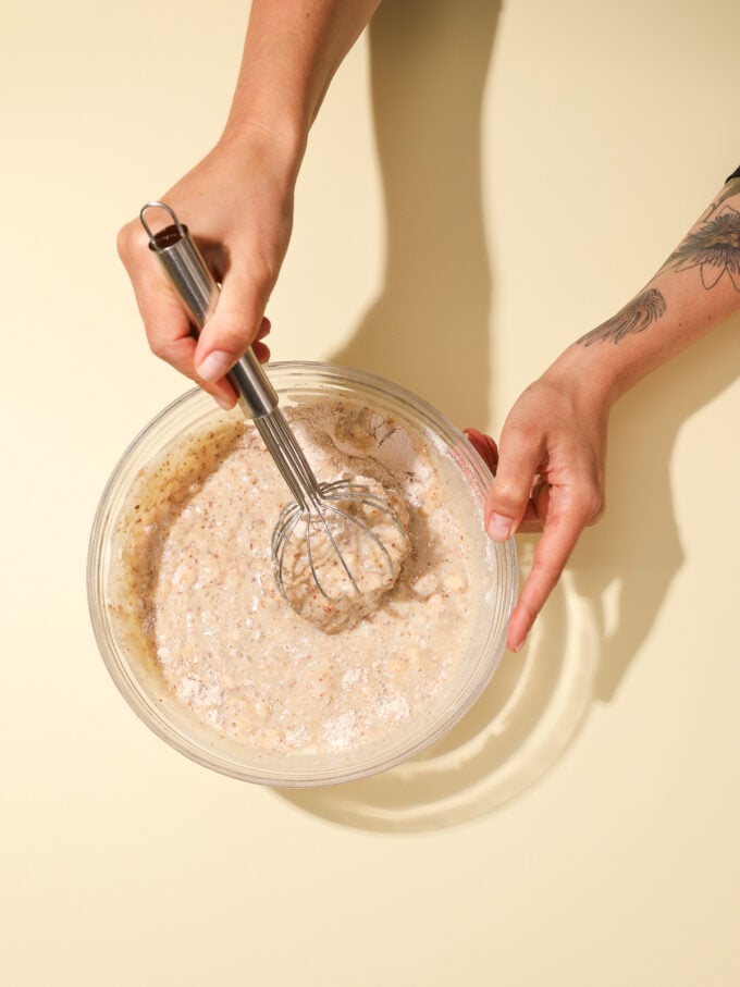 hand whisking muffin batter