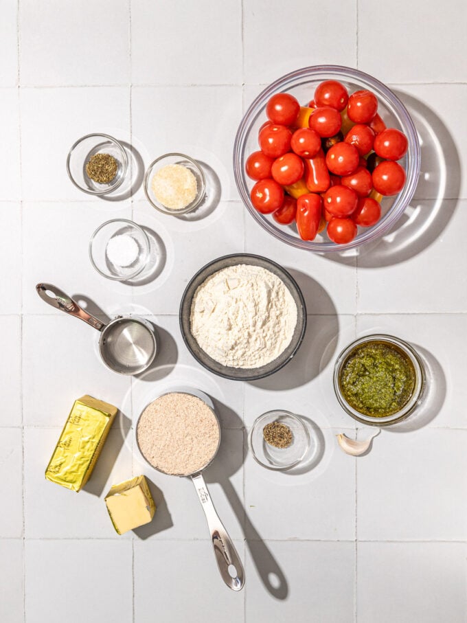 cherry tomatoes, flour and butter in bowls