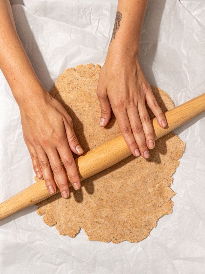 hands rolling dough